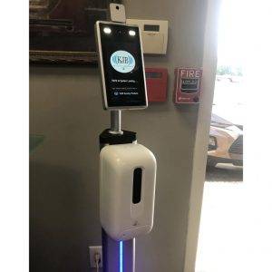 TMT2 camera mounted on a 4 Ft stand with a hand sanitizer dispenser attached.