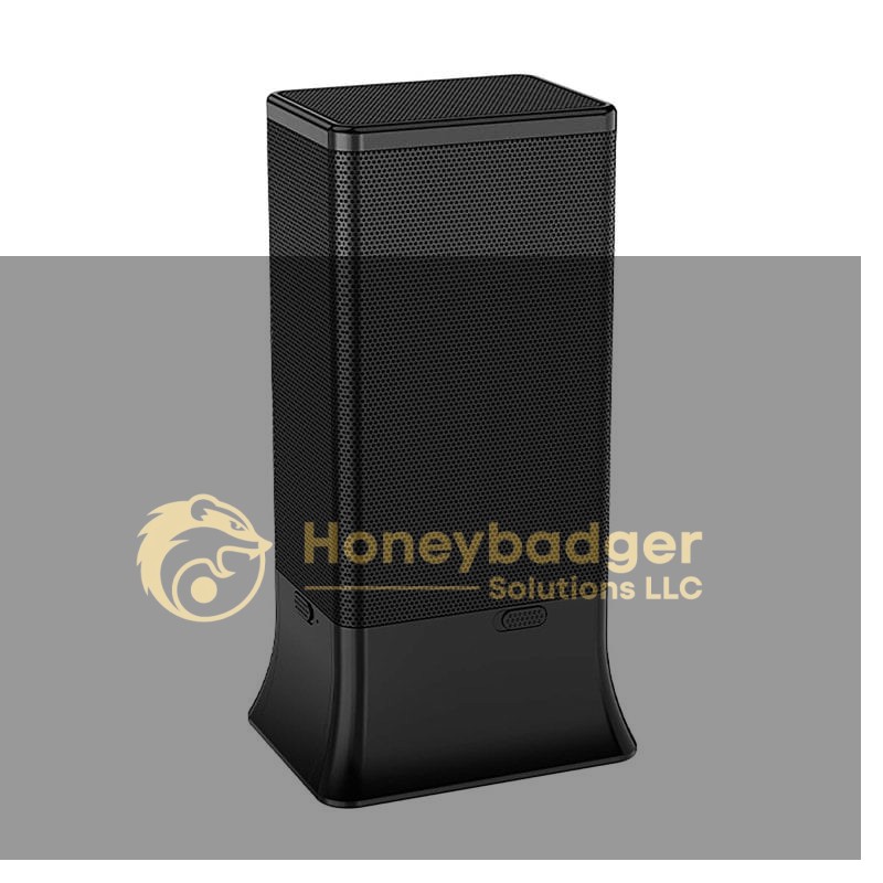A black wireless speaker with a rectangular shape and a perforated grille, designed for audio playback.
