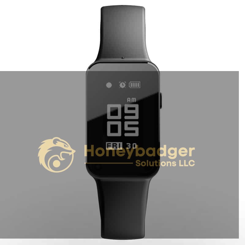 Black digital smartwatch with rectangular display showing time and date, featuring battery and notification icons.