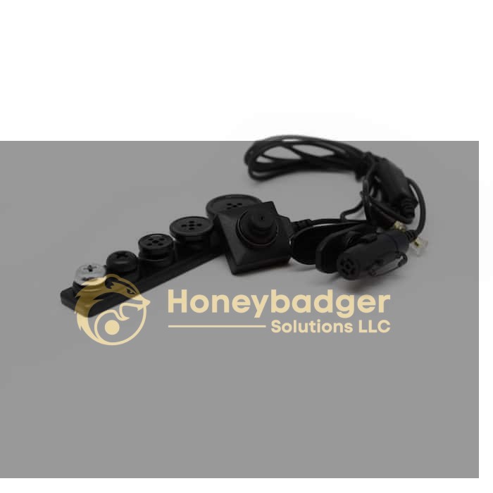 LawMate Surveillance Kit includes a covert black cable button camera, spare covers for disguise, and an audio earpiece.