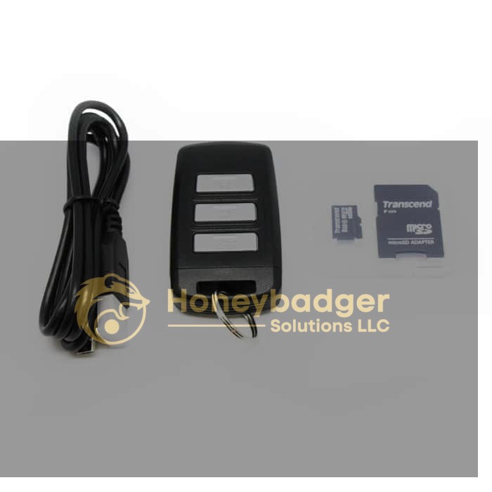LawMate Surveillance Kit including a black USB cable, a four-button key fob, and a Transcend microSD card with adapter.