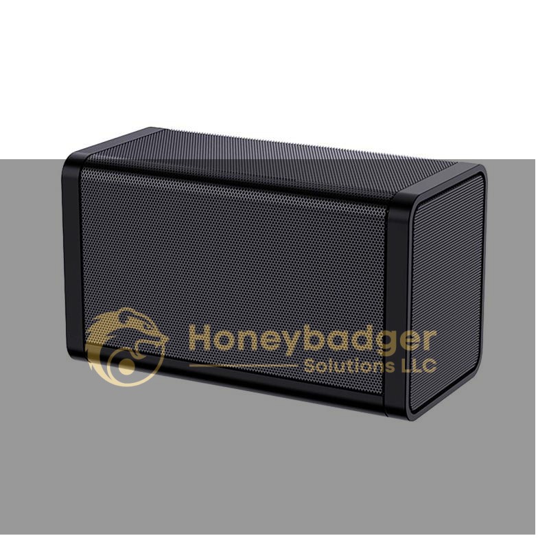 Rectangular black wireless Bluetooth speaker with a perforated metal grille on the front and sides.
