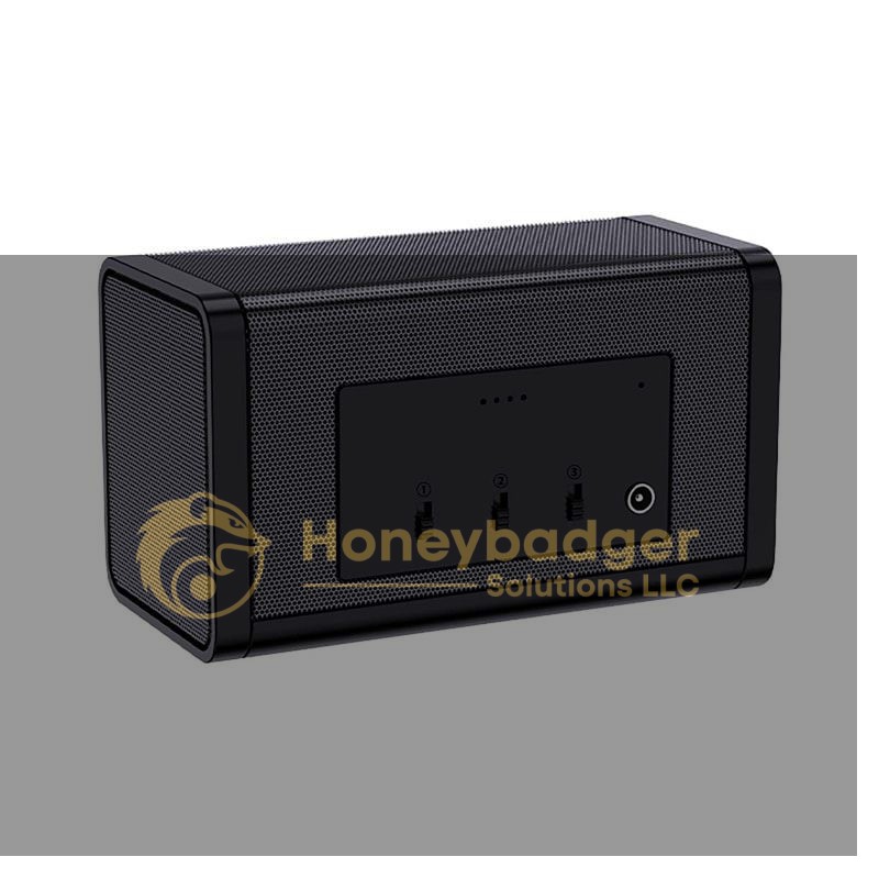Black rectangular wireless speaker with a mesh exterior and front control buttons.