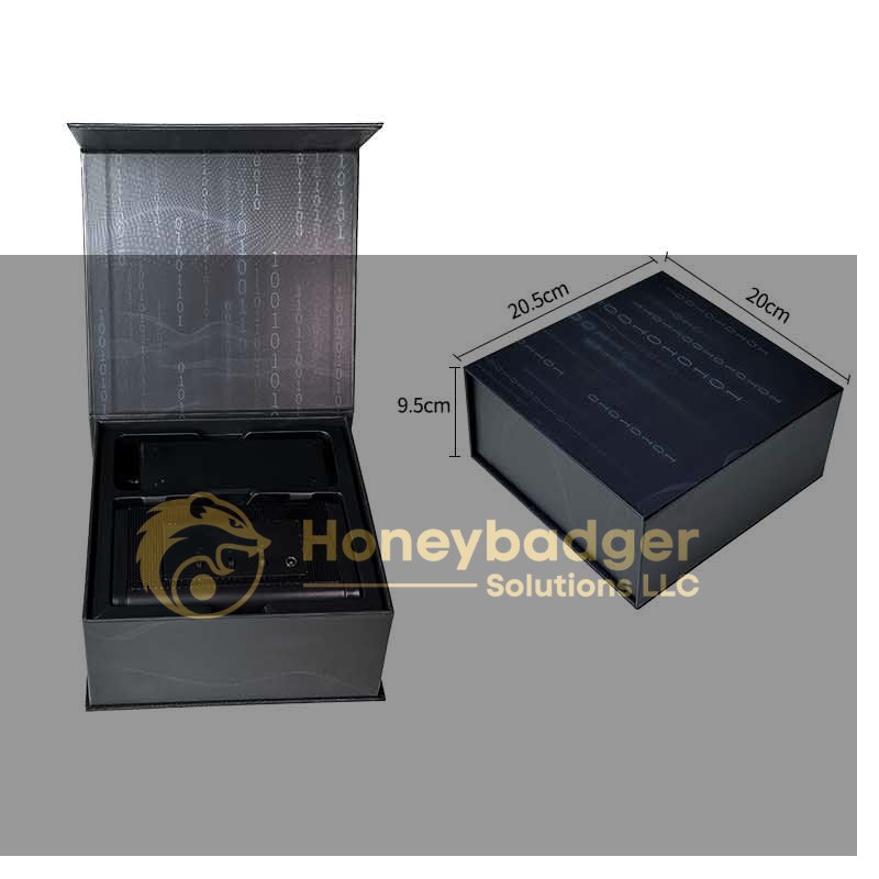Black electronic security device displayed in an open box measuring 20.5 x 20 x 9.5 cm.
