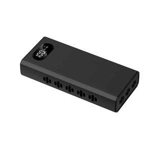 Black rectangular power bank with a digital display showing '100%' and vent-like slots for durability.