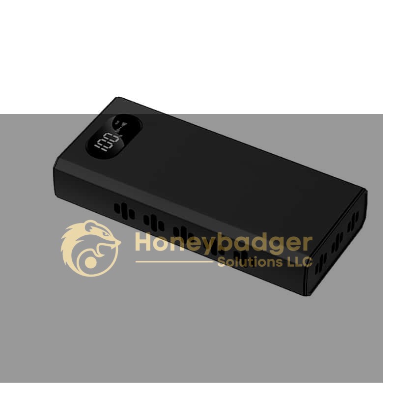 Black rectangular power bank with a digital display showing '100%' and vent-like slots for durability.