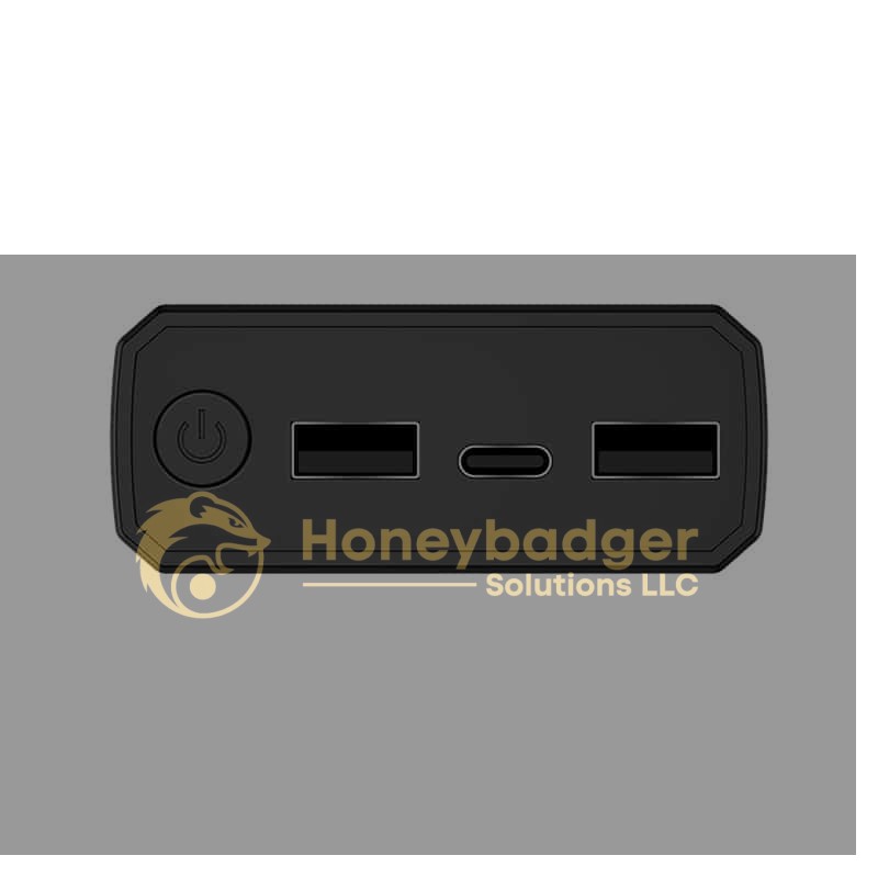 Close-up view of a black panel of a Power Bank Style Anti-Recorder with a power button and USB ports.