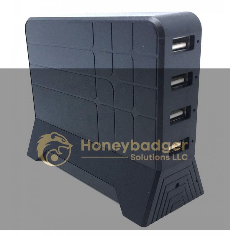 Black USB charging station with a geometric surface pattern and four USB ports for connectivity.