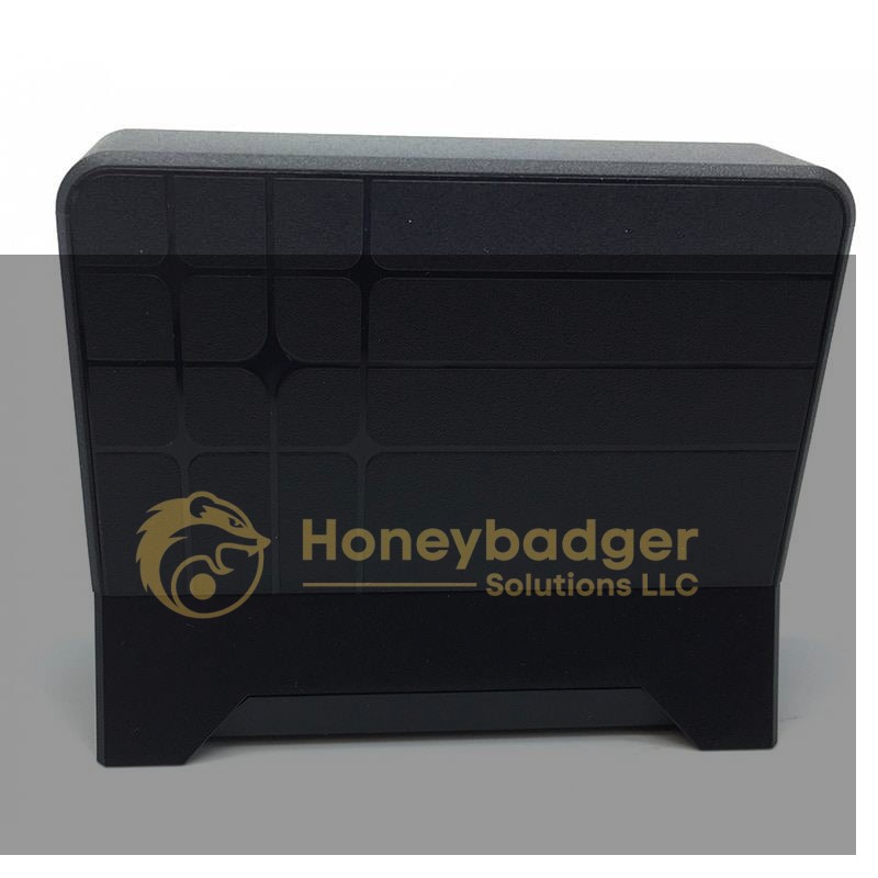 A black rectangular USB charging station hidden DVR camera with a geometric grid pattern on the front.