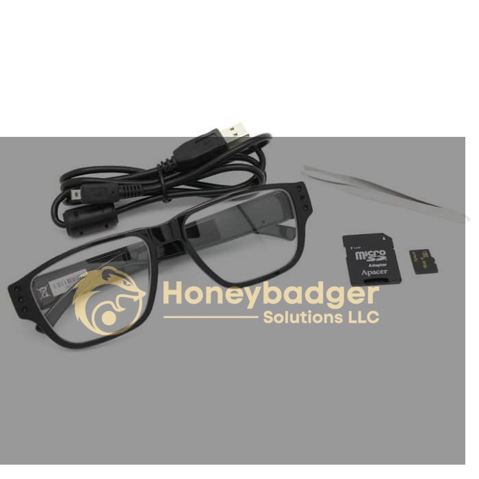LawMate Surveillance Kit includes black camera glasses, USB cable, tweezers, microSD card, and adapter on a white background.
