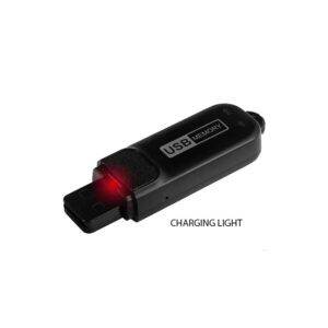 Black USB stick voice recorder with a red charging light near the USB connector labeled 'USB MEMORY'.