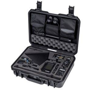 Black hard-shell carrying case with foam compartments and lid pouches for organizing digital forensics equipment.