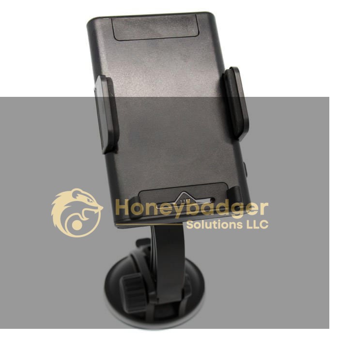 Black adjustable smartphone holder with side grips and a suction cup base for secure mounting in vehicles.