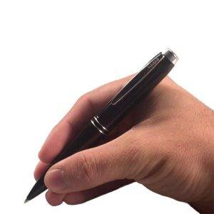 A right hand holds a One-Touch Pen Voice Recorder, ready to write against a plain white background.