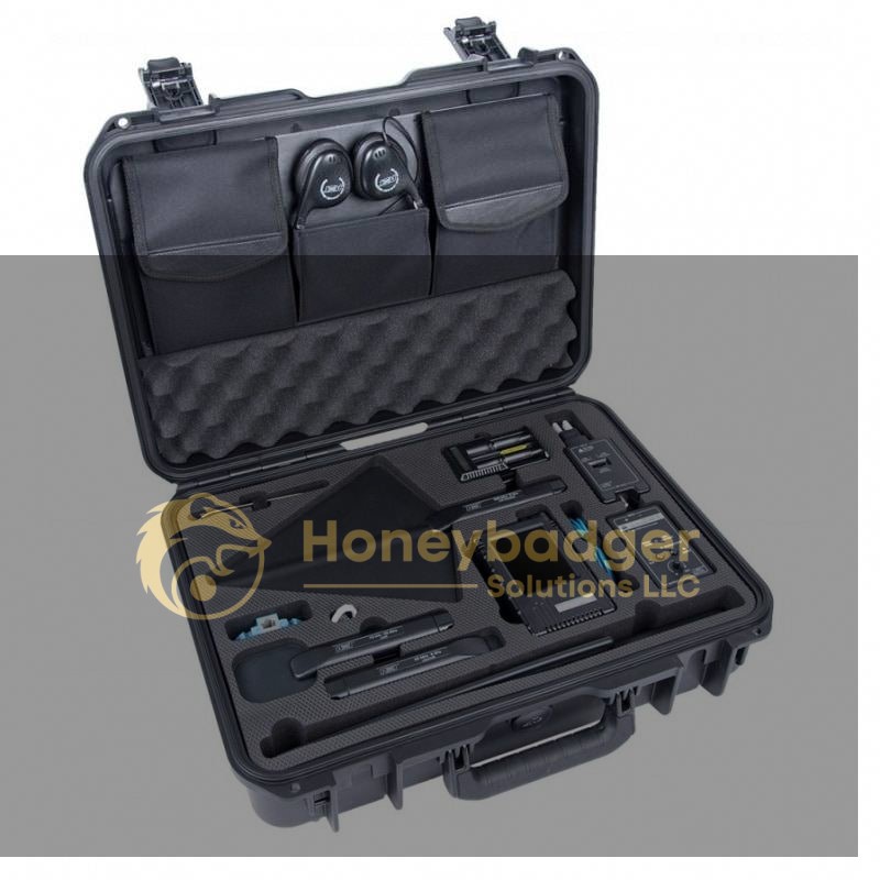 Black hard-shell carrying case containing organized digital forensics tools, electronics, and accessories.