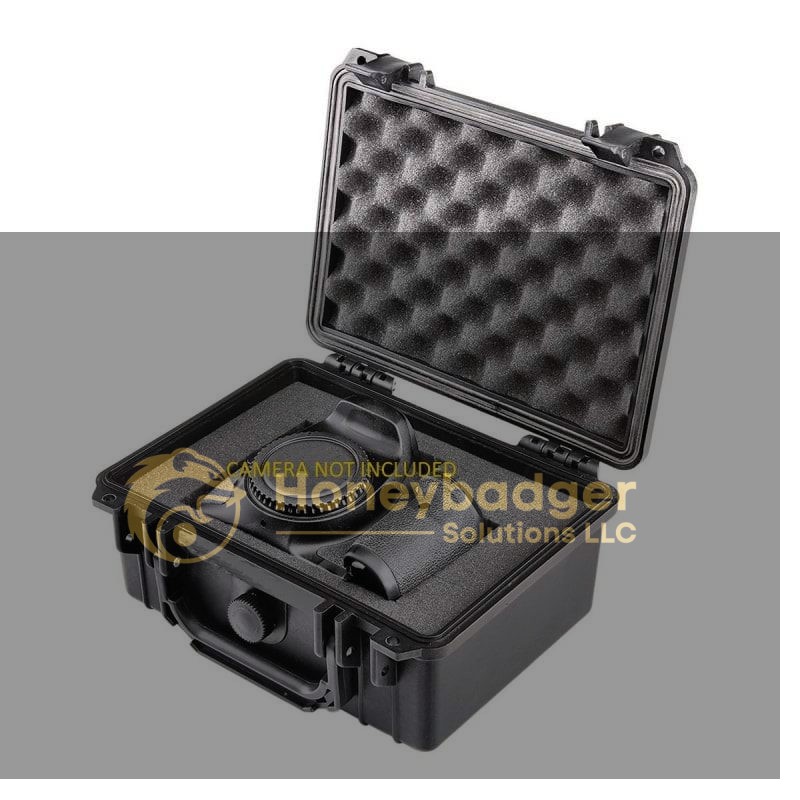 Waterproof protective case shown open with foam padding and a camera-shaped cutout inside. Text on the foam reads 'CAMERA NOT INCLUDED.'