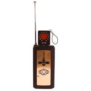 Law-Grade PRO Sweep Defender Deluxe 10G handheld radio with a gold front panel, black body, and long antenna.