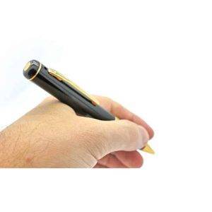 A hand holds a black video pen with gold accents, designed for capturing video content.