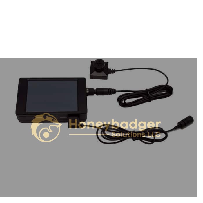 Pro DVR Button Camera Bundle includes a compact display screen, a small square camera, and a power cable arranged neatly.