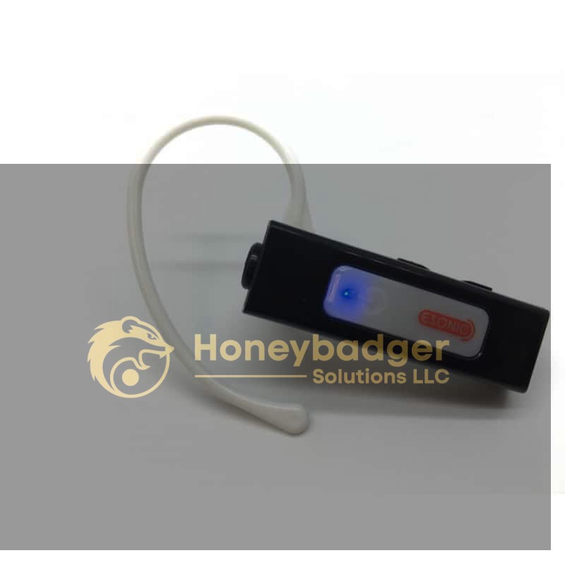 A black Mini Voice Amplifier with a white silicone ear hook and a small blue indicator light.