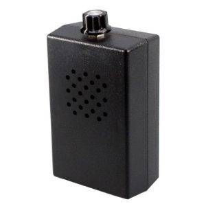 The J1000 White Noise Generator is a compact black device with a circular knob and front ventilation grid.