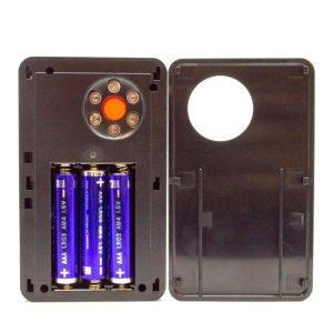 LawMate Pocket RF Detector with black plastic cover removed, showing two AA batteries and LED lights.
