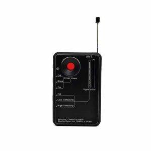 Black handheld hidden camera finder and radio detector with an antenna, large red button, and labeled switches.