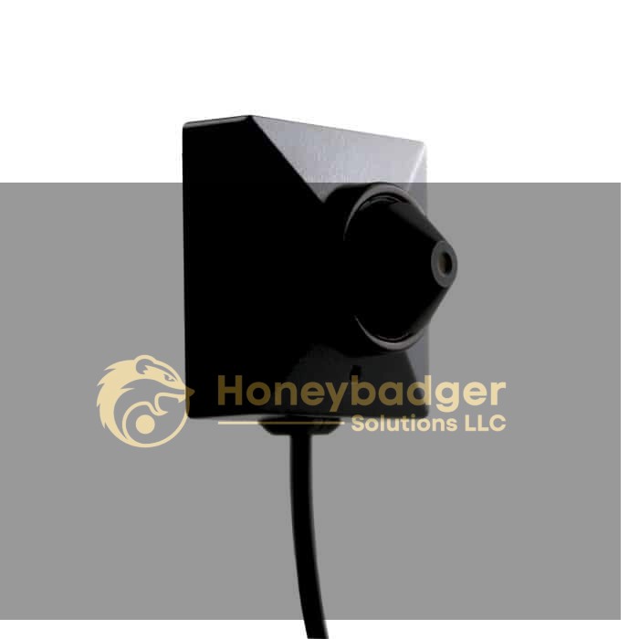 Close-up of the HD Cone Lens Button Camera, a compact black surveillance device with a protruding lens and cable.