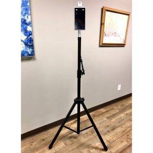 Adjustable tripod stand securely holding a tablet with a white sensor, suitable for various applications.