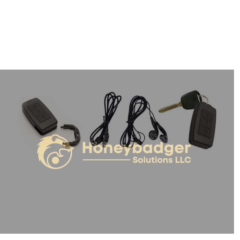 Key fob style voice recorder set including a compact recorder, clip, wired earphones, and a key with fob.