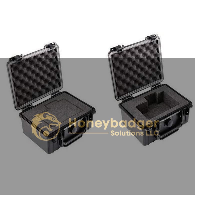 Two black waterproof protective cases with foam padding, one with flat foam and one with custom cut-outs, displayed open.