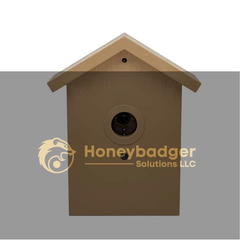 Tan wooden birdhouse with a pitched roof and central circular entrance for birds.