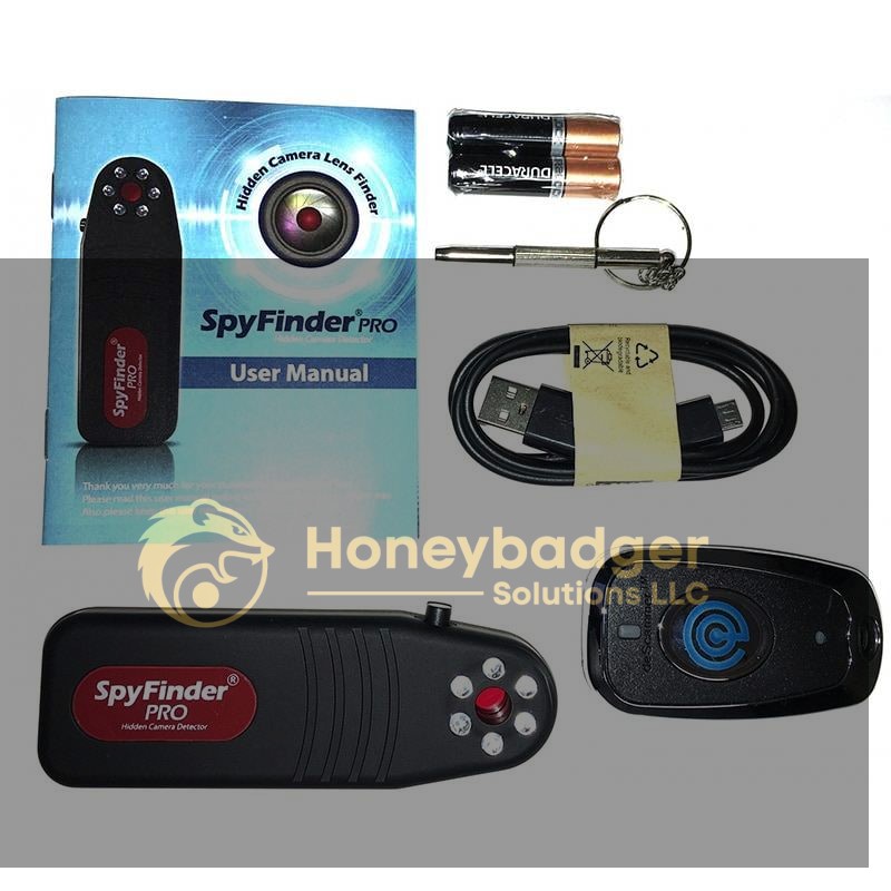 SpyFinder Pro kit including a hidden camera lens detector, user manual, USB cable, battery, keychain tool, and a small black device.