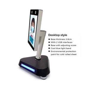 Desktop mounting stand for TMT2 featuring a digital screen displaying a masked face, with a triangular base and USB ports.
