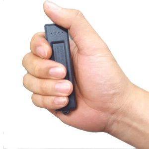 A hand holds a small black Digital Voice Recorder & Power Bank labeled 'POWER' against a white background.