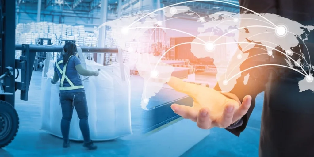 A worker handling a large bag in a warehouse with a digital global supply chain graphic overlay.