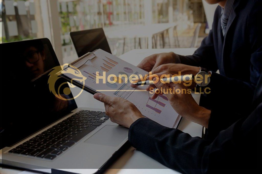 Businessman analyzing financial charts and graphs on a clipboard during a meeting.