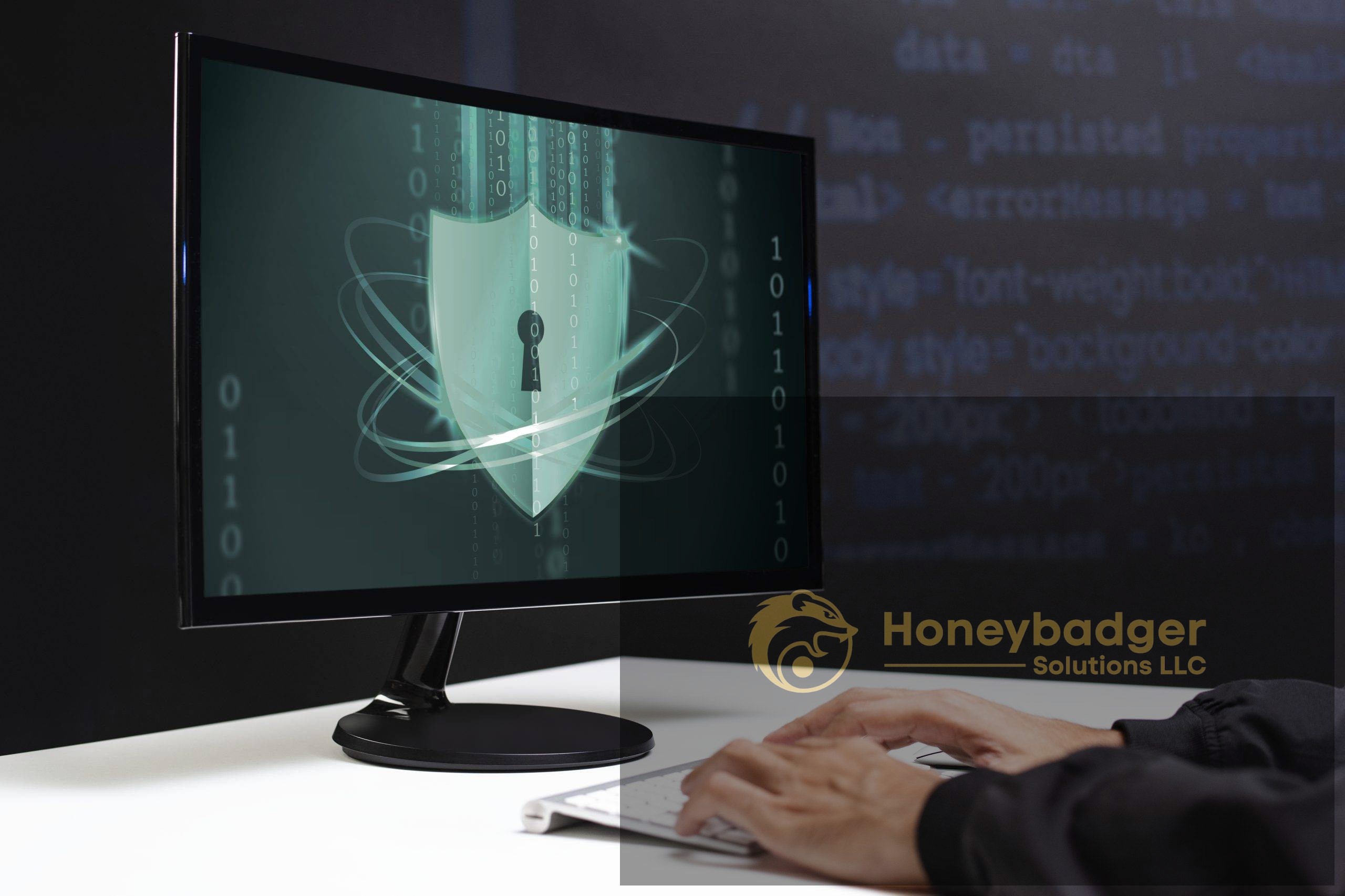 Computer monitor showing a digital shield with a keyhole, representing data security concepts.