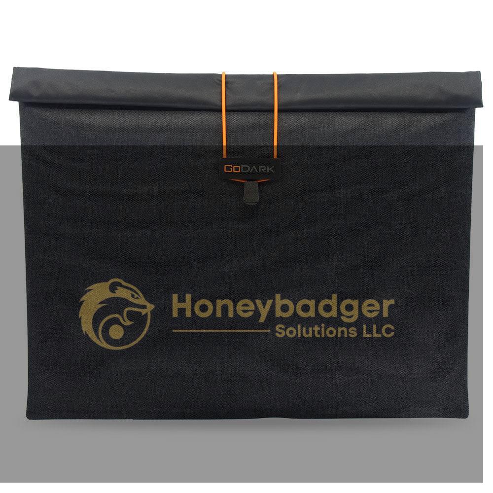 GoDark black storage bag with an orange drawstring closure and logo on the front.